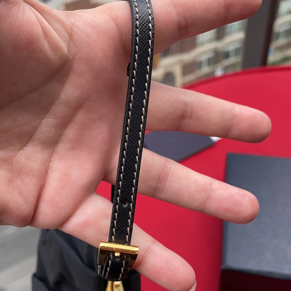 ⛔️SOLD⛔️ PRADA Black Wristlet with Gold accents. - Picture 13 of 16